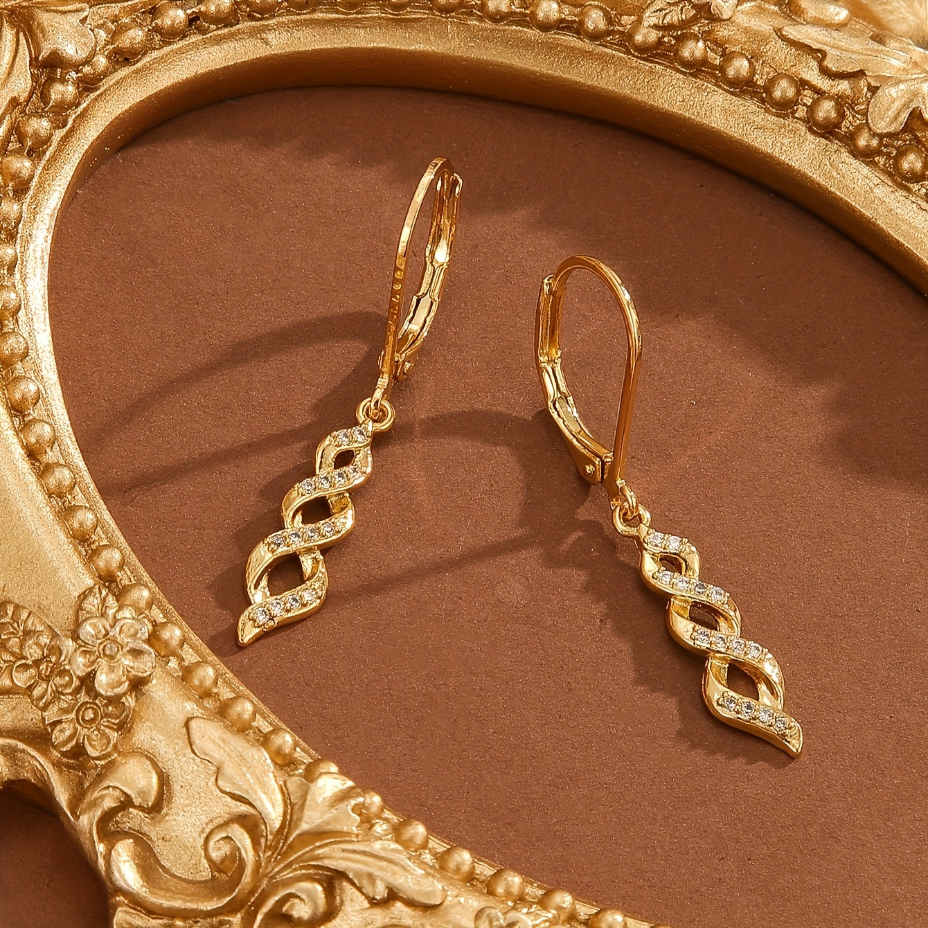 Shimmer Twist Ava Oorbellen | Goud
