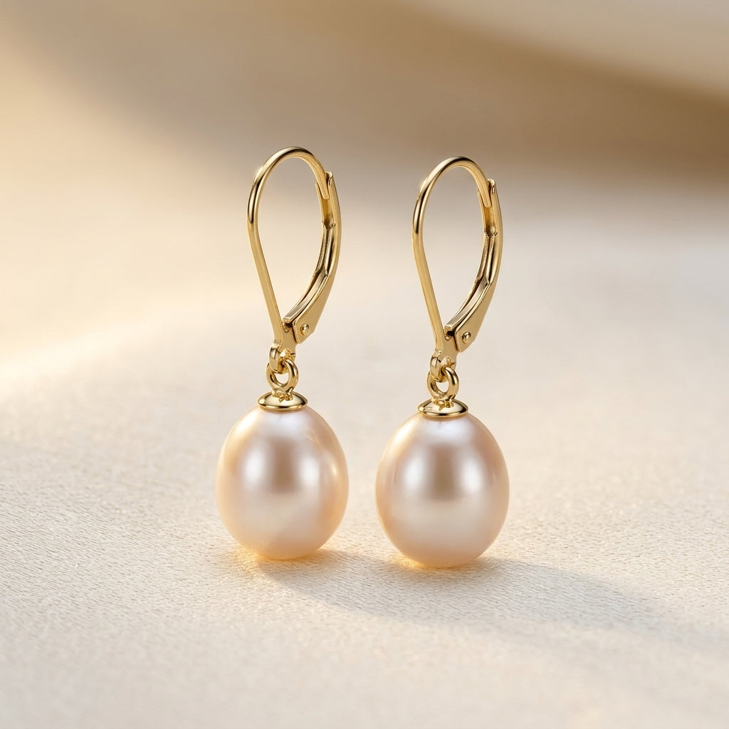 Perle Dangle Oorbellen | Goud