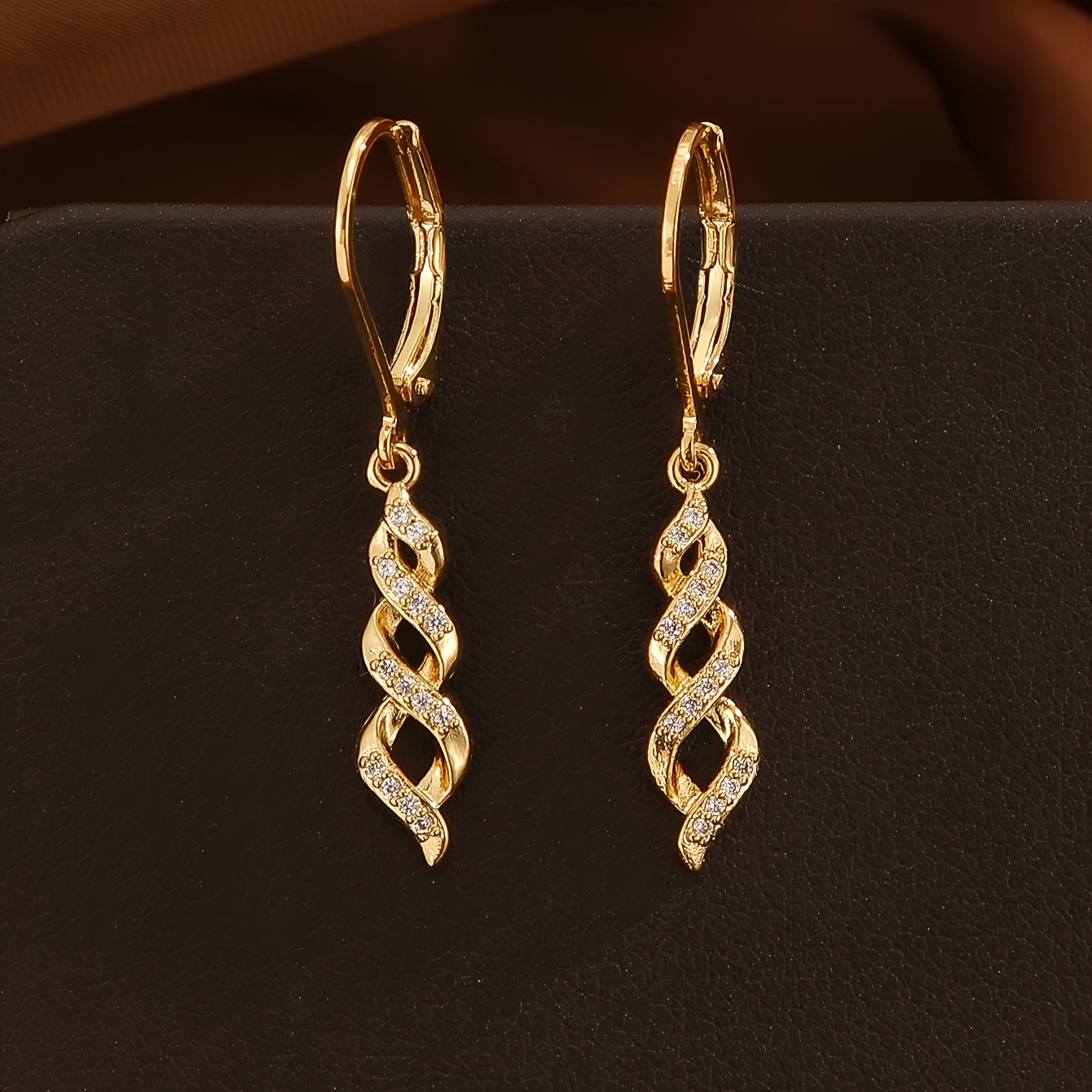 Shimmer Twist Ava Oorbellen | Goud