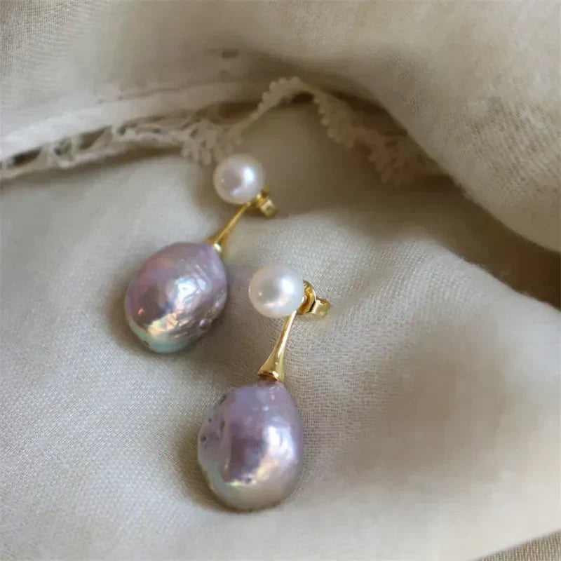 Exclusieve Paarse Parel Oorbellen | Goud